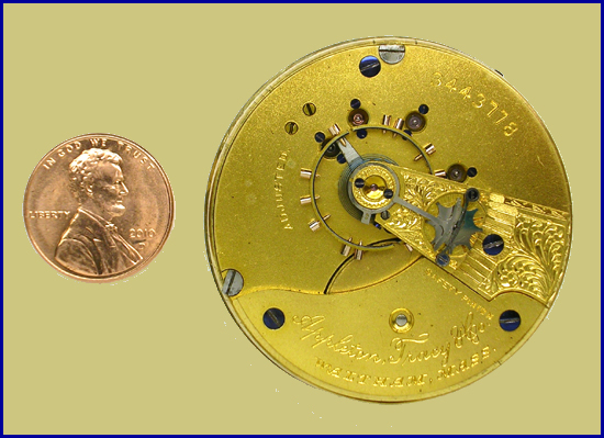 Waltham 18 Size Movement - Model of 1882 compared in size to a United States one cent coin.